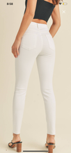 Load image into Gallery viewer, High Rise Scissor cut white jeans.
